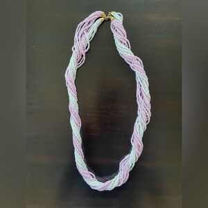 A Pair of Pink and White Bead Necklaces